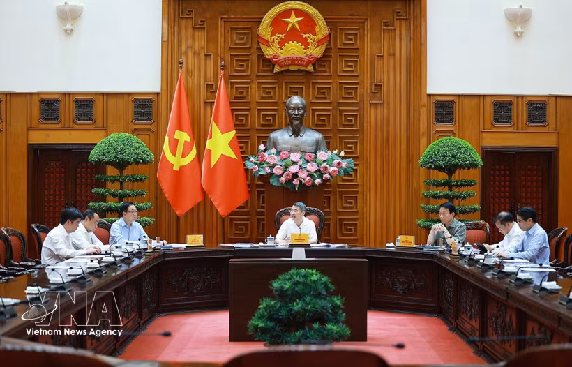 Prime Minister Le Minh Hung chairs a meeting on the national digital architecture framework in Hanoi on July 3. (Photo: VNA)