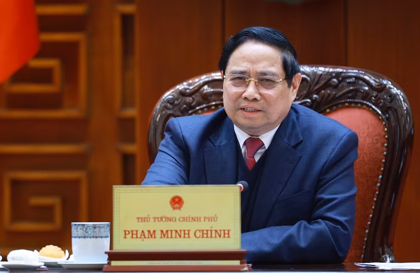 Prime Minister Pham Minh Chinh chairs a January 26 meeting in Hanoi of the standing government members and the Standing Board of the Government Party Committee on reports and submissions to competent authorities regarding nuclear power projects. (Photo: VNA)