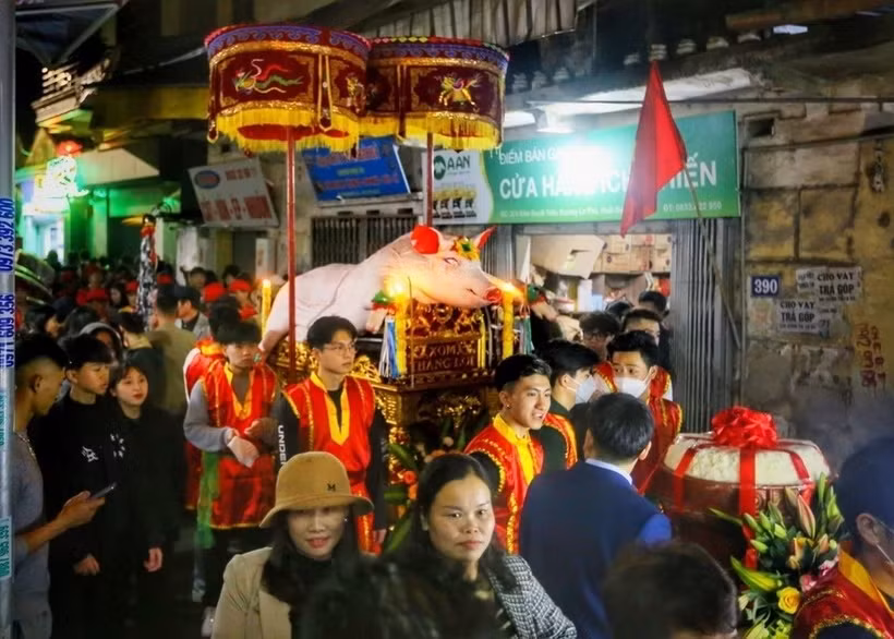 At the pig procession ceremony (Photo: VNA)