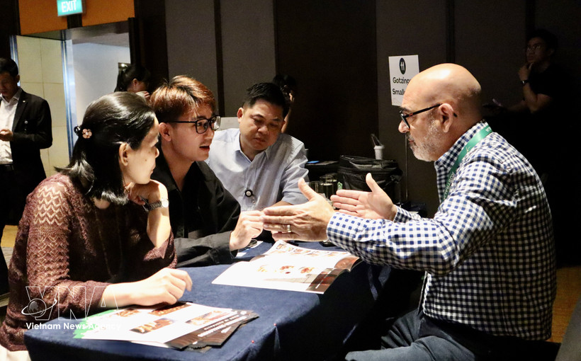 Australian and Vietnamese food enterprises discuss partnership on March 19. (Photo: VNA)