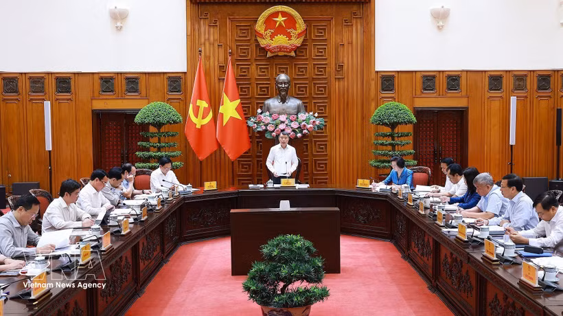 Prime Minister Le Minh Hung chairs the inaugural meeting of the Central Steering Committee for National Target Programmes on July 9. (Photo: VNA)