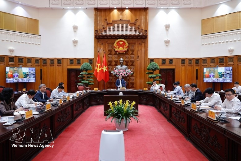 At the meeting of standing Government members on March 18, 2026 (Photo: VNA)
