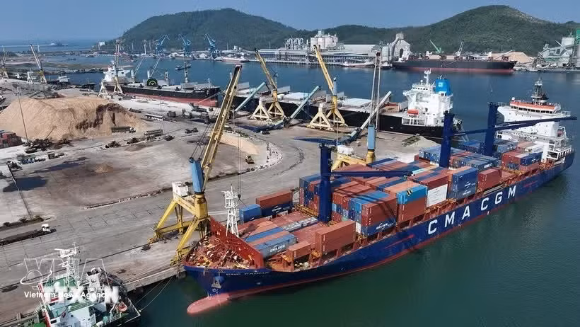 Imported containers are handled at Nghi Son International Port in Thanh Hoa province. (Photo: VNA)