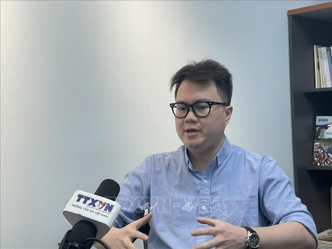 Enzo Sim Hong Jun, a Malaysian researcher specialising in Southeast Asian history and defence, grants an interview to the Vietnam News Agency. (Photo: VNA)