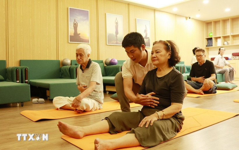 Elderly people take part in activities at a daytime care centre for senior citizens. (Photo: VNA)