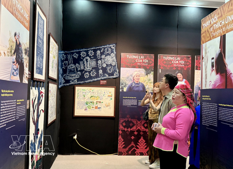 The exhibition brings authentic stories of ethnic minority women in the buffer zone of Hoang Lien National Park as they adapt to climate change and develop sustainable ecotourism. (Photo: VNA)