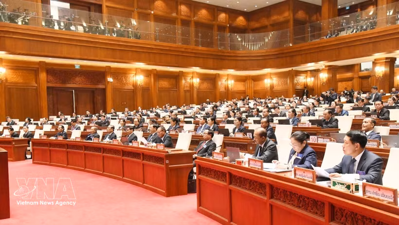 Deputies attend the first session of the 10th National Assembly of Laos. (Photo: VNA)