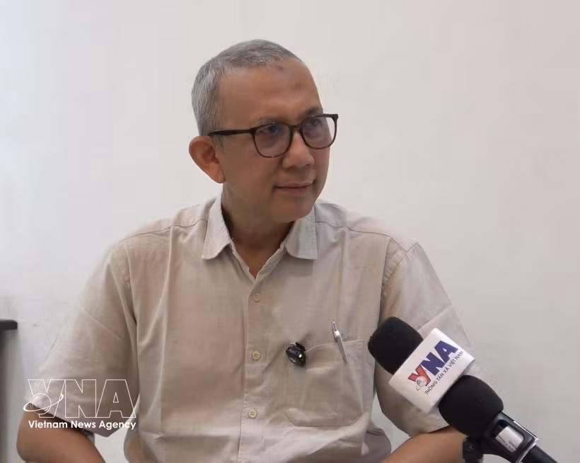 Beni Sukadis, Senior Coordinator at the Indonesian Institute for Defence and Strategic Studies, grants an interview to the Vietnam News Agency. (Photo: VNA)