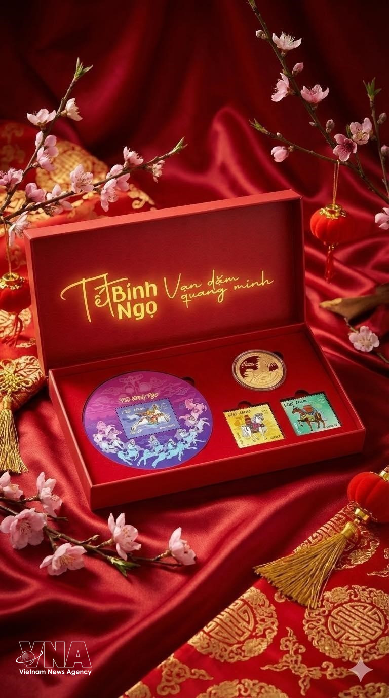 The horse-themed stamp set and commemorative coin. (Photo: VNA) 