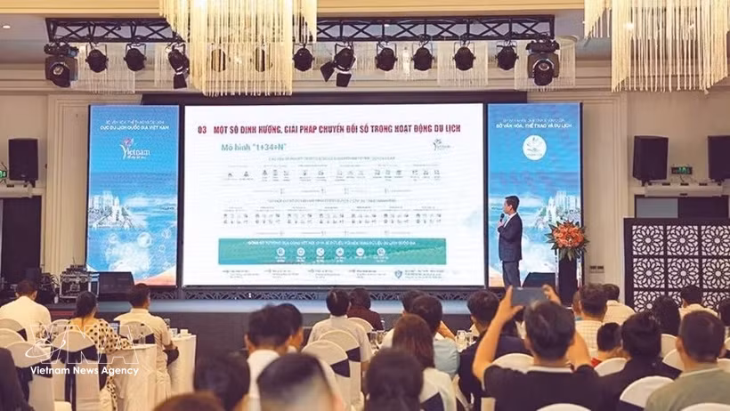 At a digital transformation implementation guidance programme in the tourism sector in July 2026. (Photo: VNA)