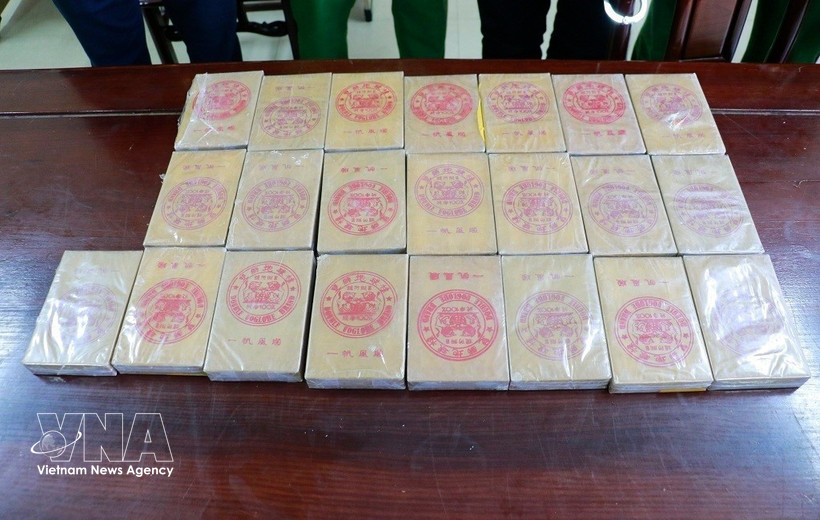 Exhibits in the case include 20 bricks of heroin. (Photo: VNA)