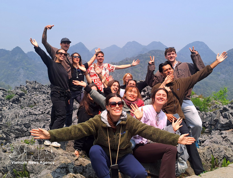 Foreign tourists excited by Ha Giang travel experiences. (Photo: VNA)