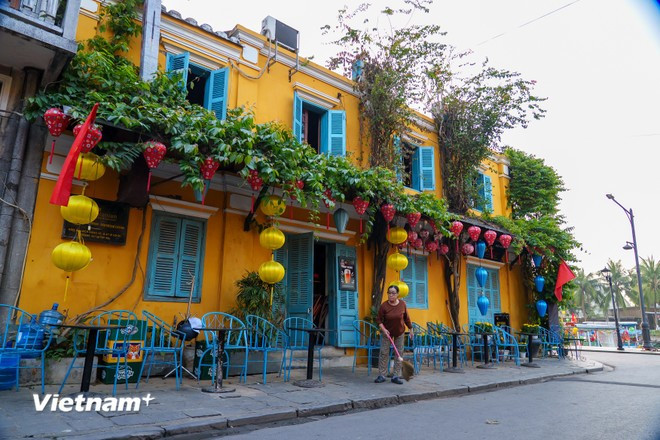 In front of ancient houses at daybreak, as residents begin to wake. (Photo: VNA)