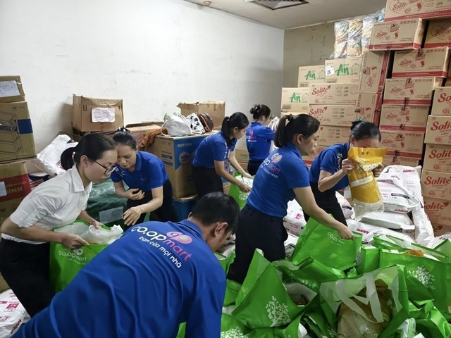 Co.opmart Hue staff pack relief goods to ensure they reach those in need as quickly as possible. (Photo courtesy of Saigon Co.op)