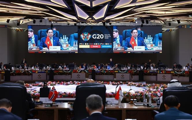 Prime Minister Pham Minh Chinh speaks at the G20 Summit’s third session on November 23. (Photo: VNA)