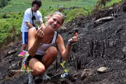 Int'l visitors enjoy planting trees while exploring Dong Van Karst Plateau 