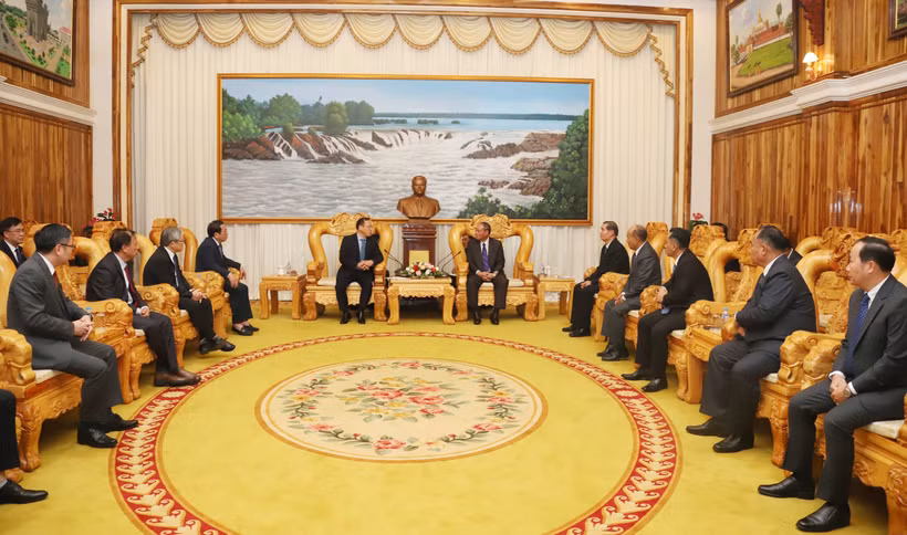 Participants at the conference in Vientiane on December 20 to review the progress of a project on building a resident and citizen identity management system in Laos (Photo: VNA)