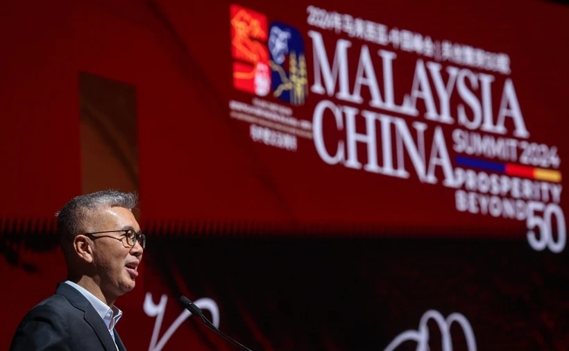 Malaysian Minister of Investment, Trade, and Industry Tengku Datuk Seri Zafrul Abdul Aziz addresses the Malaysia - China Summit 2024. (Photo: Malaymail)