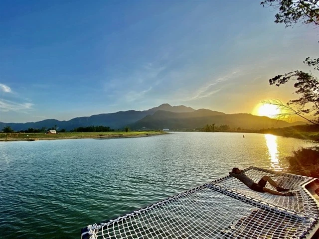 A visitor relaxes at Yen Retreat in Nam Yen village, Hoa Bac commune, Da Nang, which was named one of Asia's top tourist destinations for 2025 by the UK-based travel publication Time Out. (Photo: VNA) 