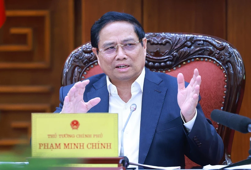 Prime Minister Pham Minh Chinh addresses the meeting (Photo: VNA)