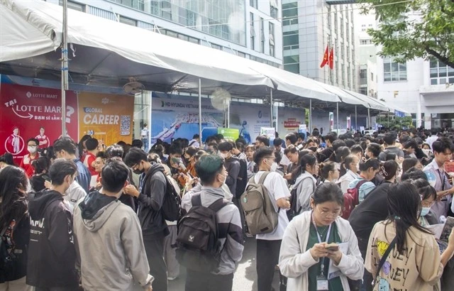 Labourers at a job fair held in HCM City (Photo: VNA)