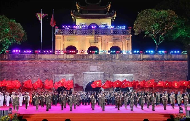 A performance of artists from the Military Music Song and Dance Theatre. (Photo: VNA)