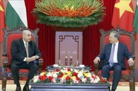 Party General Secretary To Lam (right) receives Speaker of the Jordanian House of Representatives Mazen Turki El Qadi in Hanoi on February 3. (Photo: VNA)