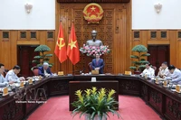 Prime Minister Pham Minh Chinh chairs the meeting on April 1. (Photo: VNA)