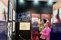 The exhibition brings authentic stories of ethnic minority women in the buffer zone of Hoang Lien National Park as they adapt to climate change and develop sustainable ecotourism. (Photo: VNA)