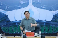 Prime Minister Pham Minh Chinh speaks at a working session with contractors and construction units of the Long Thanh International Airport project on December 14, 2025 (Photo; VNA)