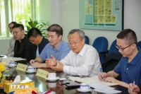 Editor-in-Chief of the People’s Daily of China Chen Jianwen (second from right) (Photo: VNA)