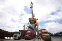 Trucks carrying export goods at Tan Vu Port in Hai Phong city (Photo: VNA)