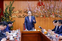 National Assembly (NA) Chairman Tran Thanh Man (centre) speaks during a working session with the NA's Committee for National Defence, Security and External Affairs on February 24. (Photo: VNA)