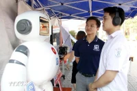 Young people visit an innovation event held in the northern province of Bac Giang. (Photo: VNA)