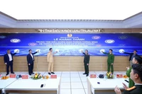 Delegates perform the inauguration protocol for the Hanoi smart traffic control centre in the capital on December 13. (Photo: VNA)