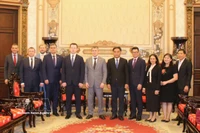 Officials of Ho Chi Minh City and the delegation of Perm Krai at the meeting on March 27 (Photo: VNA)