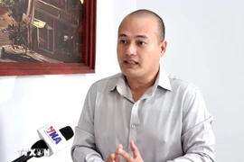 Thong Mengdavid, a geopolitical and international affairs analyst at the Institute for International Studies and Public Policy (IISPP) under the Royal University of Phnom Penh (RUPP), talks to the Vietnam News Agency. (Photo: VNA)