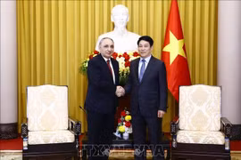 State President Luong Cuong (R) receives Prosecutor General of Azerbaijan Kamran Bayram Aliyev (Photo: VNA)