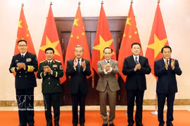 The Vietnamese and Chinese ministers of foreign affairs, national defence and public security pose for a photo at the first ministerial-level “3+3” strategic dialogue in Hanoi on March 16. (Photo: VNA)