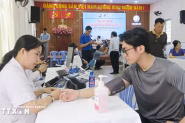 Residents of Ho Chi Minh City's Binh Quoi ward receive free health check-ups. (Photo: VNA) 