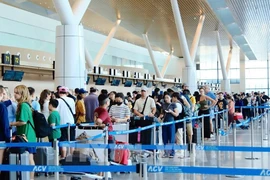 Passengers at Terminal 3 of Ho Chi Minh City's Tan Son Nhat International Airport (Illustrative photo: VNA)