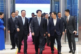 State President Luong Cuong (C) inspects the rehearsal for the UN Convention against Cybercrime signing ceremony (Photo: VNA)