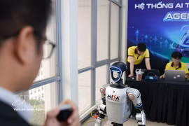 A product is showcased at the exhibition area during AI Day 2026. (Photo: VNA)