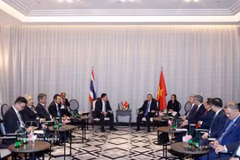 General Secretary of the Communist Party of Vietnam (CPV) Central Committee and State President To Lam (R) receives Thammasak Sethaudom, President and Chief Executive Officer of Siam Cement Group (Photo: VNA)