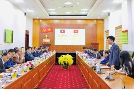 An overview of the talks between leaders of Lai Chau and Oudomxay provinces (Photo: VNA)