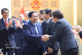 Prime Minister Pham Minh Chinh meets with leaders of Japanese businesses. (Photo: VNA)