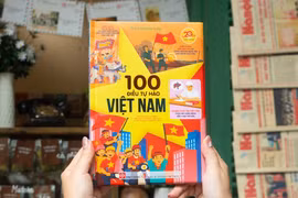 The illustrated book “100 Dieu tu hao Viet Nam” (Photo: nhandan.vn)