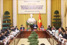 At the press conference to announce the State President’s order to make public nine new laws. (Photo: VNA)