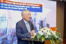 Permanent Deputy Prime Minister Nguyen Hoa Binh speaks at the UK-Vietnam high-level IFC conference (Photo: VNA)