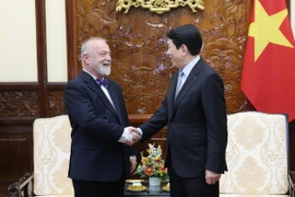 State President Luong Cuong (R) meets with Czech Ambassador to Vietnam Hynek Kmonicek on February 3. (Photo: VNA)
